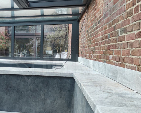 Adoquín de travertino gris plateado